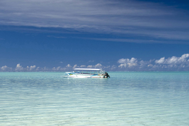 Take a ride in a Tahitian outrigger canoe when you visit Bora Bora. These motorized boats are modern versions of the traditional Polynesian canoe of yore. A cruise in these boats makes a great way to see the sights in the Bora Bora lagoon. (Photo Credits: © Helen Havard) 